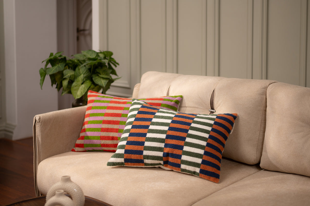 Prisme Korall og oliven boucle pynteputetrekk 40x60 cm