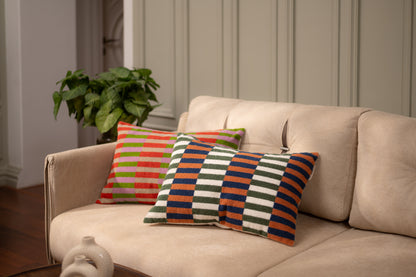 Prisme Korall og oliven boucle pynteputetrekk 40x60 cm